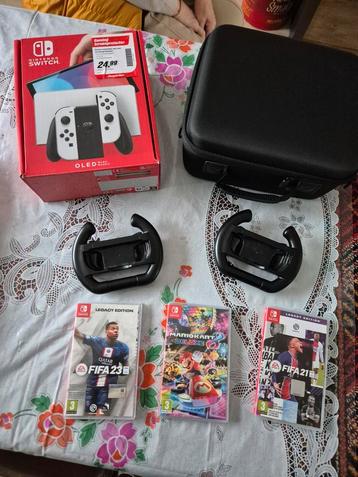 Nintendo Switch OLED in doos + Games & Accessoires beschikbaar voor biedingen