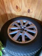 Originele mazda velgen met band, Ophalen