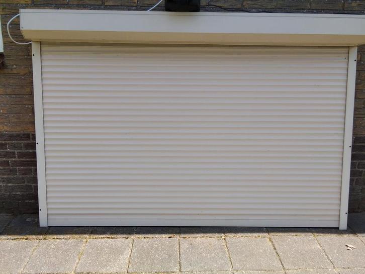 Heroal electrisch rolluik 213 breed en 125 hoog( hellbeige ), Doe-het-zelf en Verbouw, Rolluiken, Gebruikt, 200 cm of meer, Ophalen