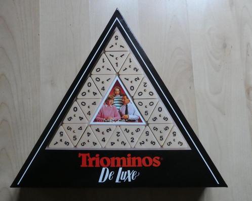Triominos de Luxe vanaf 6 jaar., Hobby en Vrije tijd, Gezelschapsspellen | Bordspellen, Zo goed als nieuw, Een of twee spelers