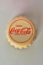 Vintage Coca-Cola flessenopener in de vorm van een kroondop, Ophalen of Verzenden, Gebruikt, Gebruiksvoorwerp