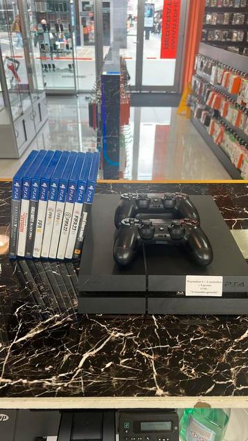 Playstation 4 + 2 controllers + 9 games beschikbaar voor biedingen