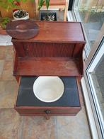 Po-stoel met po / poepdoos, Ophalen