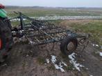 Triltand cultivator en grondbak, Grondbewerking, Ophalen