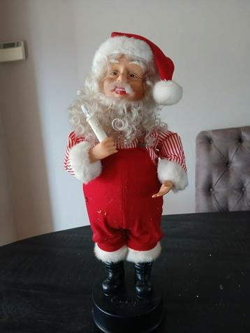 Kerstman 30 cm hoog met licht / beweging en geluidt. beschikbaar voor biedingen