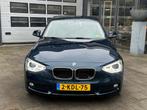 BMW 1-serie 116i Upgrade Edition | Airco | Leer | Xenon| N.A, Auto's, BMW, Gebruikt, 4 cilinders, Blauw, 1200 kg