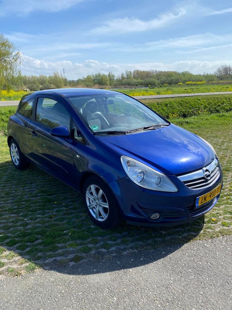 Opel Corsa 1.2 16V 3D WR 2006 Blauw, Auto's, Opel, Voorwielaandrijving, 450 kg, 40 €/maand, Zwart