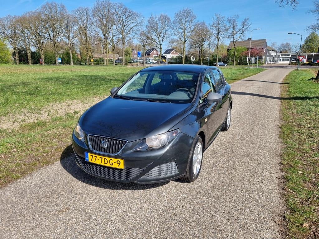 Seat Ibiza 1.2 44KW 5DRS 2012 Grijs, Auto's, Voorwielaandrijving, 31 €/maand, 1198 cc, Ibiza