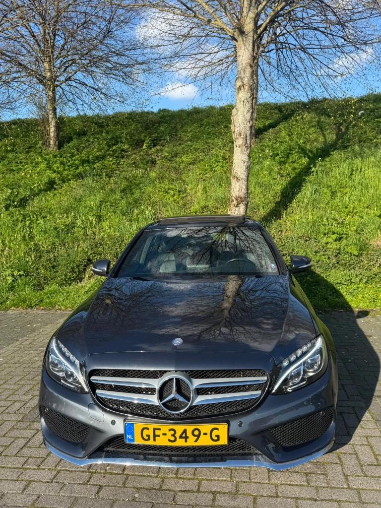 Mercedes-Benz C-Klasse C180 1.6 115KW Aut7 2015 Grijs, Automaat, 1800 kg, Zwart, Particulier