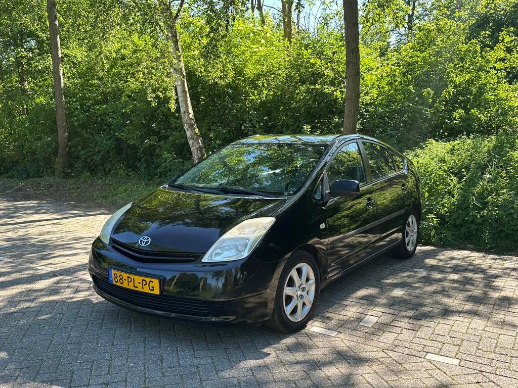 Toyota Prius 1.5 HSD 2004 Zwart, 1497 cc, 4 cilinders, Origineel Nederlands, Grijs