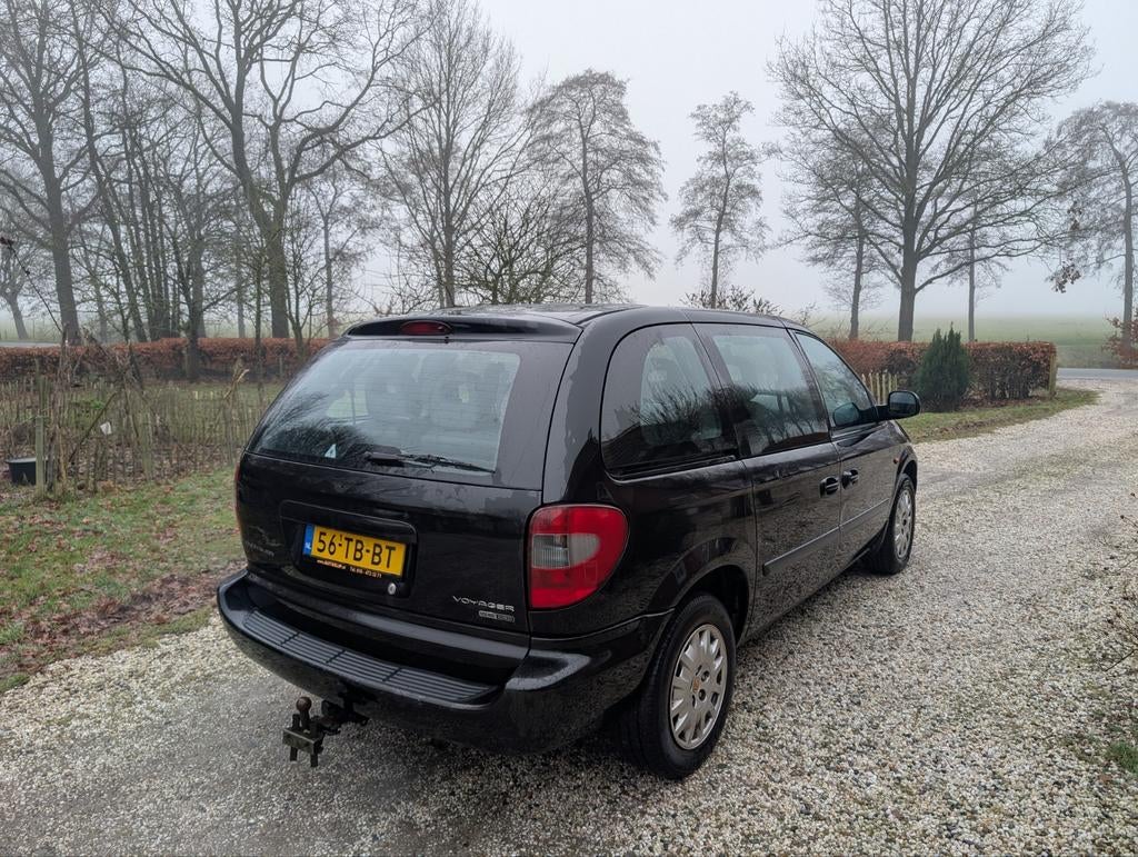 Chrysler Voyager 2.5 CRD 2006 Zwart, Auto's, Chrysler, 450 kg, 241 €/maand, 7 stoelen, Zwart