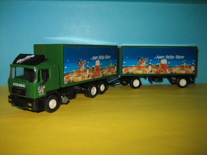 Auer-Bier  MAN  combi  Nu speciale prijs  Herpa, Hobby en Vrije tijd, Modelauto's | 1:87, Zo goed als nieuw, Bus of Vrachtwagen