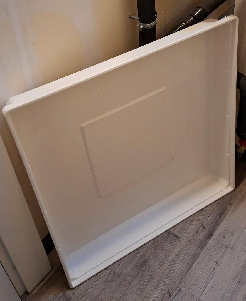 Lekbak wasmachine, Ophalen