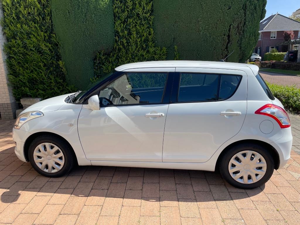 Suzuki Swift 1.2 5-D 2011 Wit - 80L LPG installatie, Auto's, Suzuki, Voorwielaandrijving, Stof, 4 cilinders, Handgeschakeld