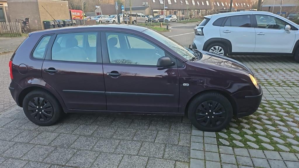 Volkswagen Polo 1.4 55KW AUT 2004 Paars, Auto's, Origineel Nederlands, Particulier, 1000 kg, 500 kg