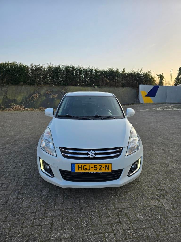 Suzuki Swift 1.2 5-D 2015 Wit ALCANTARA / AIRCO / NIEUWE APK, Auto's, Suzuki, Voorwielaandrijving, 4 cilinders, 400 kg, Handgeschakeld