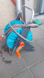 Gardena tuinslang op haspel., Tuin en Terras, Tuinslangen, Ophalen, Gebruikt, Tuinslanghaspel