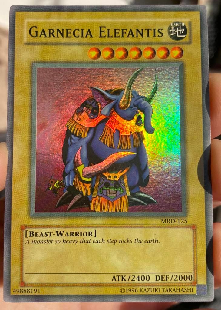 Yu-Gi-Oh! Garnecia Elefantis MRD Heavy US Faded Misprint, Ophalen of Verzenden, Gebruikt, Losse kaart, Foil