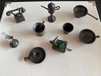 9 miniatuur tinnen voorwerpen, Ophalen