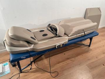 Elektrisch verwarmend massagematras en massagetafel beschikbaar voor biedingen