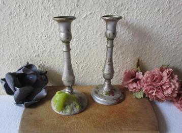 Set metalen kandelaars beschikbaar voor biedingen