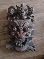 Houten masker uit China, Ophalen