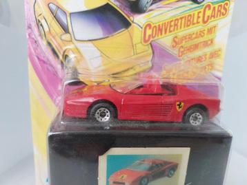 FERRARI TESTAROSSA  SWOP TOPS MATCHBOX  UIT 2002 IN BLISTER beschikbaar voor biedingen