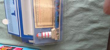 Island Ferry tin toy, in doos met certificaat beschikbaar voor biedingen