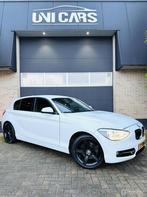 BMW 1-serie 118i 170 PK Sport|Automaat|Xenon|Navi|LM 17, Gebruikt, Zwart, 4 cilinders, 1290 kg