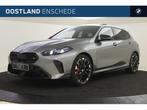 BMW 1 Serie M135i xDrive High Executive Automaat / Panoramad, Auto's, 1998 cc, Zwart, 4 cilinders, 14 km/l