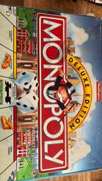Monopoly - Deluxe edition - Engelstalig, Hobby en Vrije tijd, Gezelschapsspellen | Bordspellen, Een of twee spelers, Ophalen of Verzenden