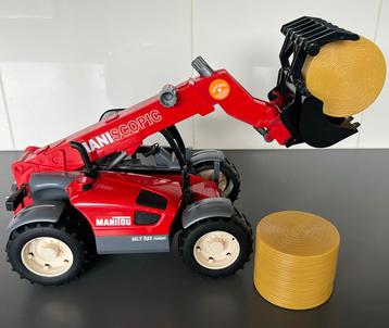 Manitou met hooibalen beschikbaar voor biedingen