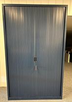 Blauwe roldeurkast, Huis en Inrichting, Kasten | Roldeurkasten en Archiefkasten, Ophalen, 100 tot 150 cm, Zo goed als nieuw, 150 tot 200 cm