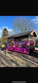 Carnavalswagen skihut, Ophalen