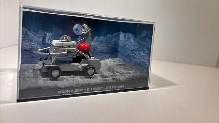 Moon buggy 007 jams bond atlas 1.43, Hobby en Vrije tijd, Modelauto's | 1:43, Zo goed als nieuw, Auto, Overige merken, Ophalen of Verzenden