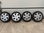 4 winterbanden met velg en wieldoppen voor o.a. toyota Aygo, Ophalen, Gebruikt