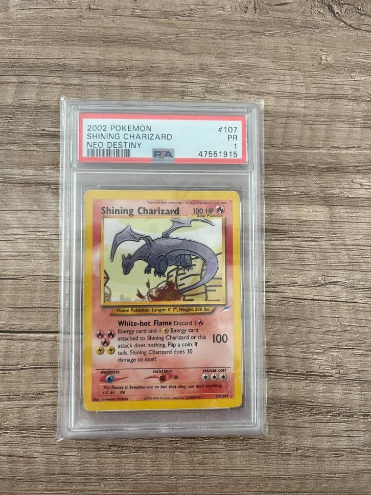Shining Charizard #107 Pokemon Neo Destiny - PSA 1, Hobby en Vrije tijd, Verzamelkaartspellen | Pokémon, Gebruikt, Losse kaart