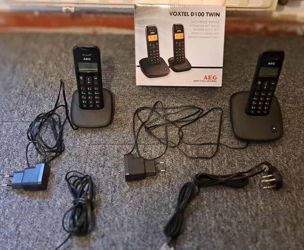 te koop set aeg voxtel d 100 twin telefoons nieuw in doos, Telecommunicatie, Vaste telefoons | Handsets en Draadloos, Ophalen of Verzenden