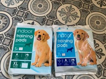 Puppy pads twee pakken (1 geopend) beschikbaar voor biedingen