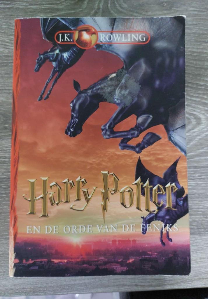 J.K. Rowling - Harry Potter en de orde van de Feniks, Boeken, Kinderboeken | Jeugd | 13 jaar en ouder, Zo goed als nieuw, Ophalen of Verzenden