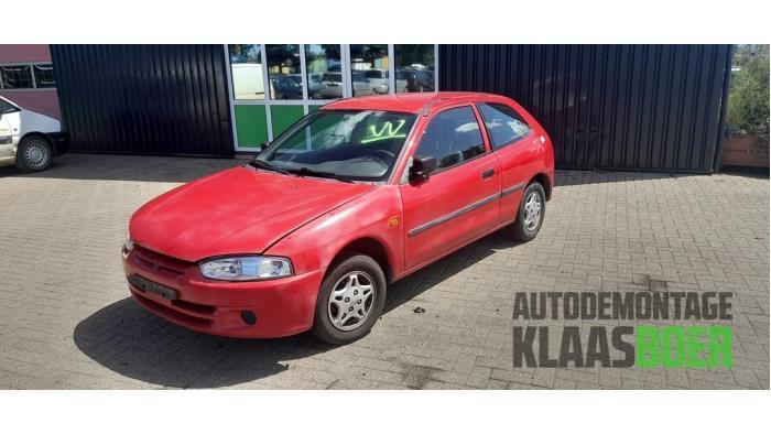 Portier 2Deurs links van een Mitsubishi Colt, Auto-onderdelen, Carrosserie en Plaatwerk, Deur, Mitsubishi, Gebruikt, 6 maanden garantie