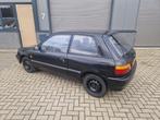 Toyota Starlet 1.3 XLI AUT E2 1995 Zwart automaat, Auto's, Toyota, Stof, 4 cilinders, Starlet, 400 kg