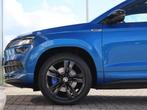 Skoda Karoq 1.5 TSI 150 pk DSG ACT Sportline Business | Trek, Stof, 4 cilinders, 150 pk, Blauw