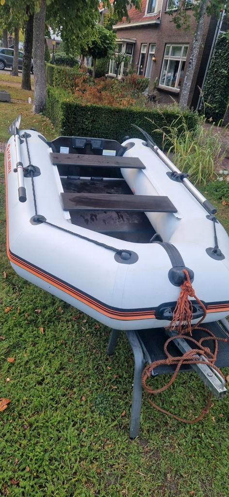 Kolibri KM-260 Rubberboot met elektromotor en handtrailer., Watersport en Boten, Rubberboten, Gebruikt, Overige merken, Hout, Minder dan 70 pk