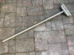 Schrobber met steel, Ophalen