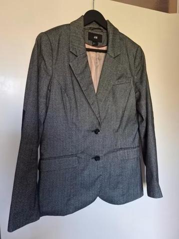 Colbertje grijs gemeleerd maat 42 beschikbaar voor biedingen