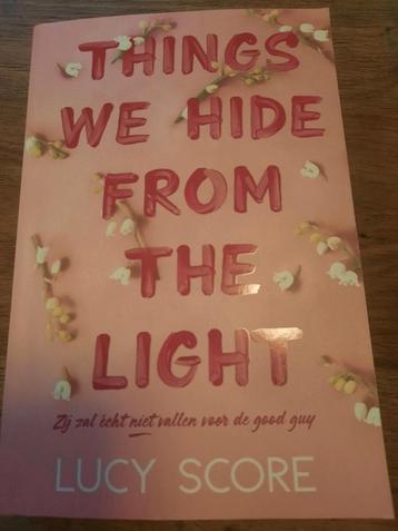 Lucy Score - Things we hide from the light beschikbaar voor biedingen