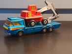 Matchbox tractor transporter met een hydraulic excavator, Ophalen of Verzenden, Gebruikt, Bus of Vrachtwagen