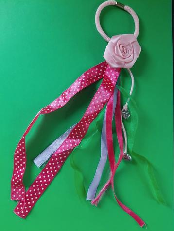 Flo tashanger of haaraccessoire  beschikbaar voor biedingen