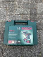 Bosch PSR 12 accuboormachine groen met lader, Doe-het-zelf en Verbouw, Gebruikt, Variabele snelheid, Ophalen of Verzenden, Boor- en Schroefmachine